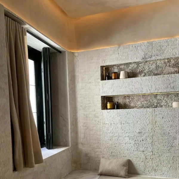 Wall with lit niches