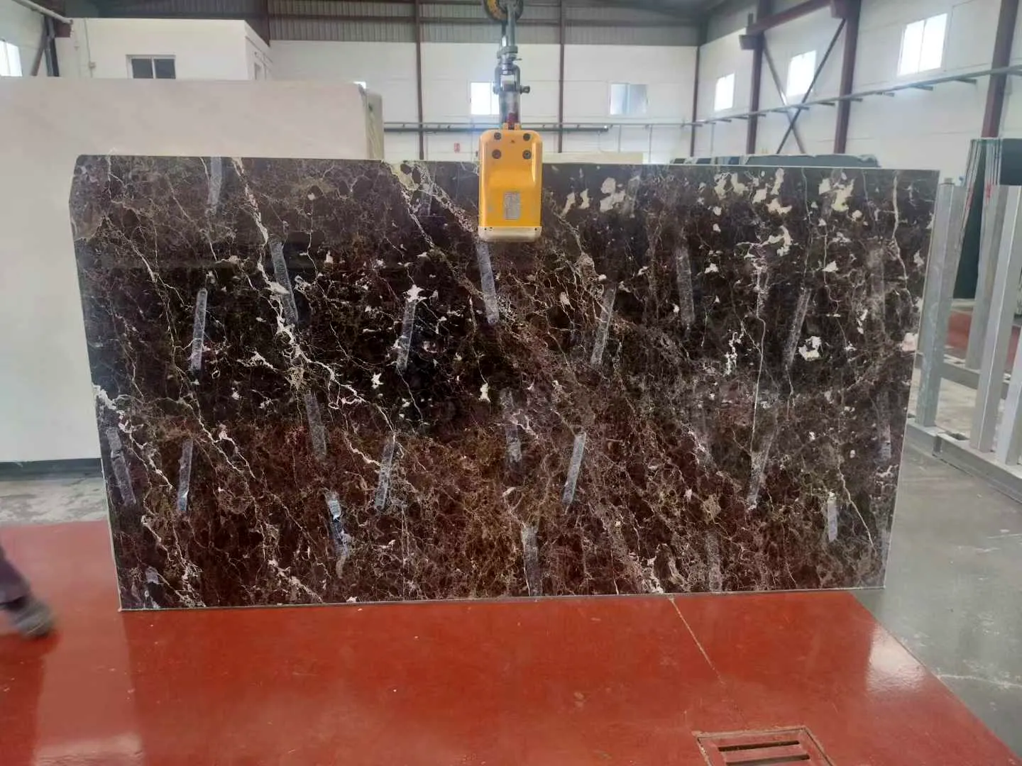 Dark Emperador Marble: real slab in our warehouse